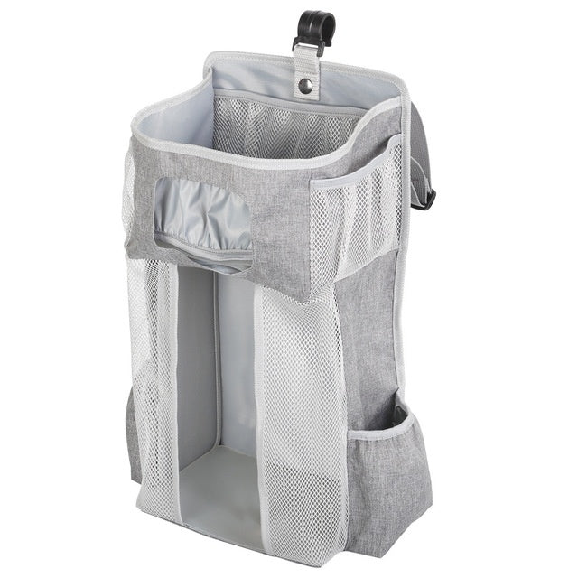 Attachable storage bags $111.79 Dana Fashion Color: Grey Baby & Mother Descriptions: Material: Oxford cloth + PP support plate + diamond mesh Size:44.6*23*16cm（as shown in the follow picture） Packaging:1 Baby crib diaper organizer