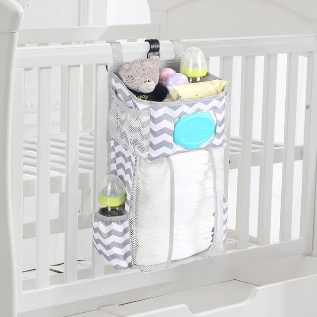 Attachable storage bags $111.79 Dana Fashion Color: Grey Baby & Mother Descriptions: Material: Oxford cloth + PP support plate + diamond mesh Size:44.6*23*16cm（as shown in the follow picture） Packaging:1 Baby crib diaper organizer