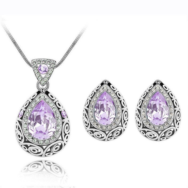 Austria crystal guard water droplet Necklace $29.00 Dana Fashion Color: Light purple Women's Accessories Style: Europe and America Material: Alloy Process: Crystal Style: Women's Set combination: earrings + items Circumference: 21cm (inclusive)-50cm (incl