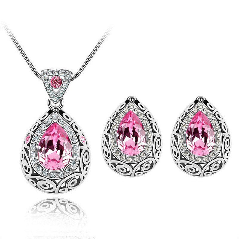 Austria crystal guard water droplet Necklace $29.00 Dana Fashion Color: Pink Women's Accessories Style: Europe and America Material: Alloy Process: Crystal Style: Women's Set combination: earrings + items Circumference: 21cm (inclusive)-50cm (inclusive) C