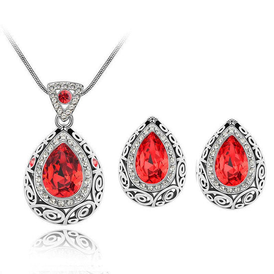 Austria crystal guard water droplet Necklace $29.00 Dana Fashion Color: Red Women's Accessories Style: Europe and America Material: Alloy Process: Crystal Style: Women's Set combination: earrings + items Circumference: 21cm (inclusive)-50cm (inclusive) Ch