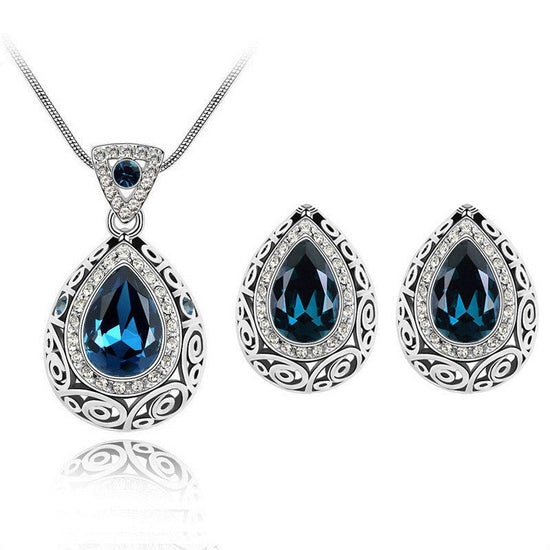Austria crystal guard water droplet Necklace $29.00 Dana Fashion Color: Dark blue Women's Accessories Style: Europe and America Material: Alloy Process: Crystal Style: Women's Set combination: earrings + items Circumference: 21cm (inclusive)-50cm (inclusi