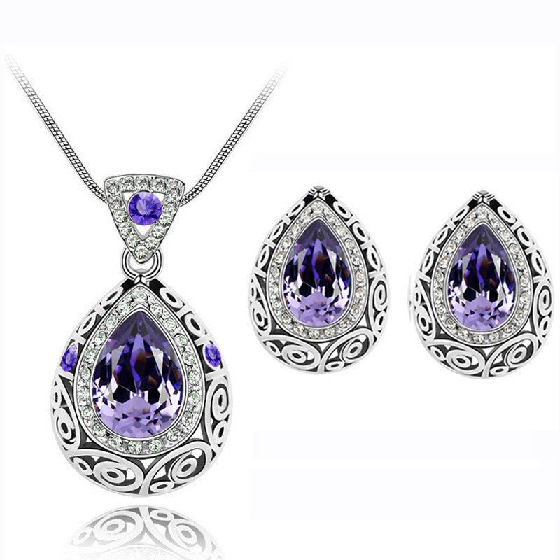 Austria crystal guard water droplet Necklace $29.00 Dana Fashion Color: Purple Women's Accessories Style: Europe and America Material: Alloy Process: Crystal Style: Women's Set combination: earrings + items Circumference: 21cm (inclusive)-50cm (inclusive)