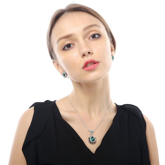Austria crystal guard water droplet Necklace $29.00 Dana Fashion Color: Blue Women's Accessories Style: Europe and America Material: Alloy Process: Crystal Style: Women's Set combination: earrings + items Circumference: 21cm (inclusive)-50cm (inclusive) C