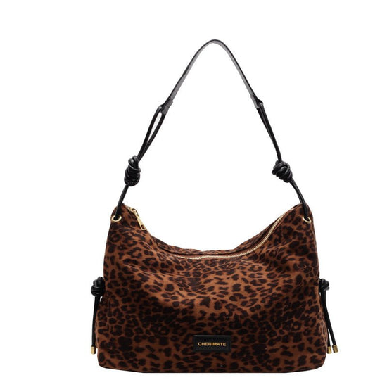 Autumn And Winter Niche Shoulder Underarm Pillow Leopard Print Women's Messenger Bag $36.00 Dana Fashion Color: Black With Leopard Print Women's Bags Product information: Lining text: Polyester Color: brown, black, brown, leopard print, black and leopard
