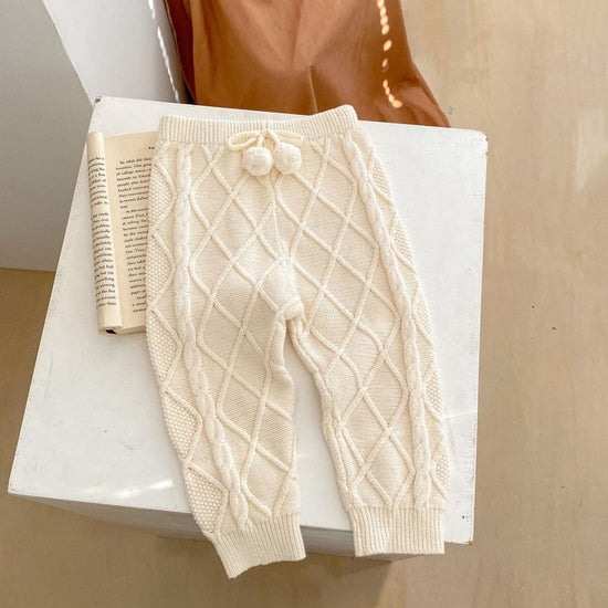 Baby Boys And Girls Rhombus Knitted Pure Beam Long Pants $39.91 Dana Fashion Color: Apricot White Suitable For Height: 100cm Baby Clothing Product information: Pattern: plaid, solid color Color: Ugyen, apricot White Pants length: trousers Fly opening: hai