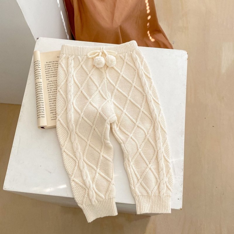Baby Boys And Girls Rhombus Knitted Pure Beam Long Pants $39.91 Dana Fashion Color: Apricot White Suitable For Height: 100cm Baby Clothing Product information: Pattern: plaid, solid color Color: Ugyen, apricot White Pants length: trousers Fly opening: hai