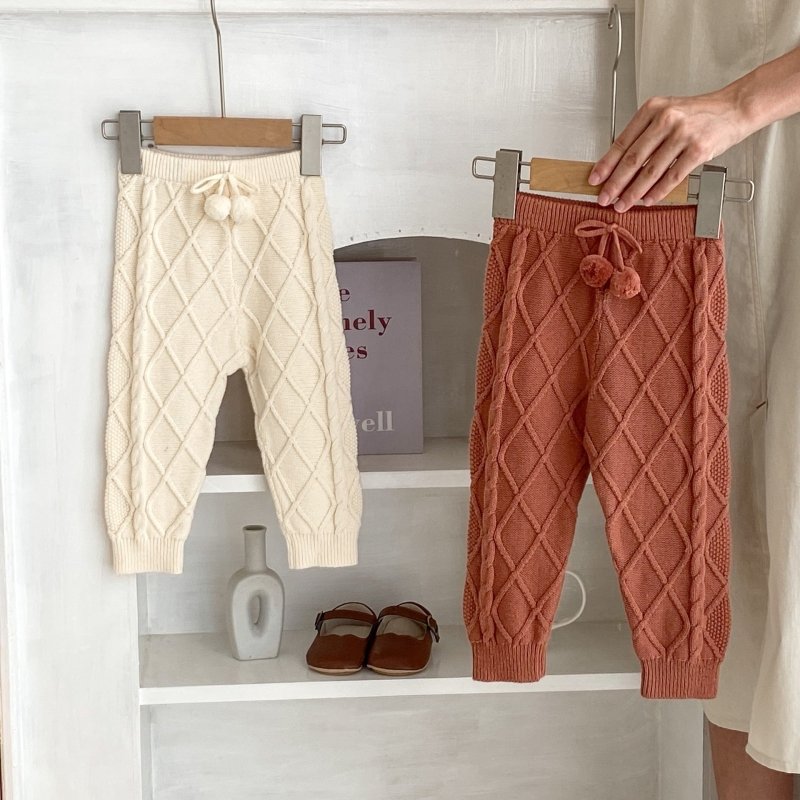Baby Boys And Girls Rhombus Knitted Pure Beam Long Pants $39.91 Dana Fashion Color: Apricot White Suitable For Height: 100cm Baby Clothing Product information: Pattern: plaid, solid color Color: Ugyen, apricot White Pants length: trousers Fly opening: hai