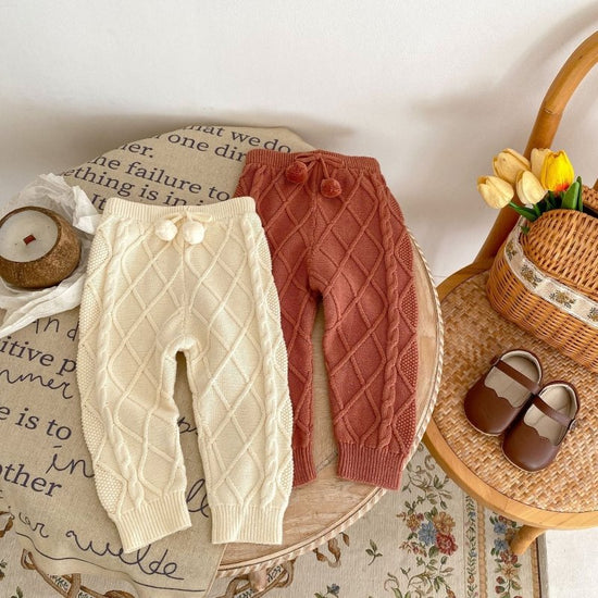 Baby Boys And Girls Rhombus Knitted Pure Beam Long Pants $39.91 Dana Fashion Color: Apricot White Suitable For Height: 100cm Baby Clothing Product information: Pattern: plaid, solid color Color: Ugyen, apricot White Pants length: trousers Fly opening: hai