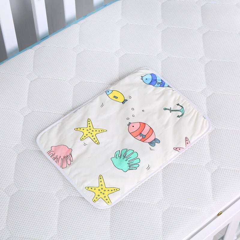 Baby cotton portable diaper changing pad $15.88 Dana Fashion Color: Seabed Baby & Mother The urine-proof pad is a must-have item for babies to go out. It is easy to carry, and the foldable button can be fixed without loosening. The first layer of pure cot
