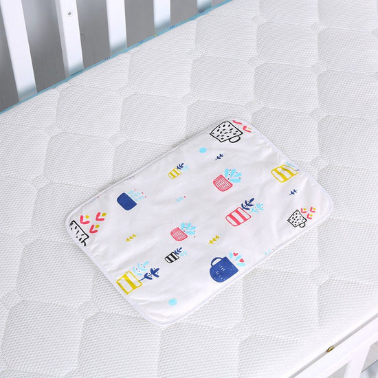 Baby cotton portable diaper changing pad $15.88 Dana Fashion Color: Potted plant Baby & Mother The urine-proof pad is a must-have item for babies to go out. It is easy to carry, and the foldable button can be fixed without loosening. The first layer of pu