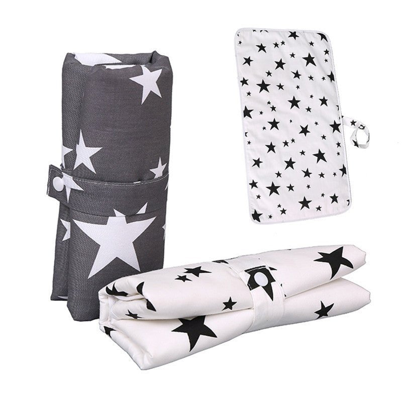 Baby cotton portable diaper changing pad $15.88 Dana Fashion Color: Big tree Baby & Mother The urine-proof pad is a must-have item for babies to go out. It is easy to carry, and the foldable button can be fixed without loosening. The first layer of pure c