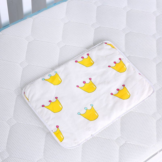 Baby cotton portable diaper changing pad $15.88 Dana Fashion Color: Little crown Baby & Mother The urine-proof pad is a must-have item for babies to go out. It is easy to carry, and the foldable button can be fixed without loosening. The first layer of pu
