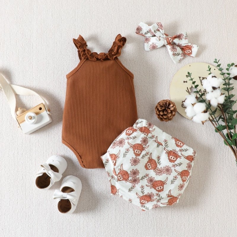 Baby Girl Clothing Ruffle Sleeveless Romper $23.50 Dana Fashion Color: Light Brown Suit Height: 100cm Baby Clothing Product information: Pattern: animal, flower Color: light brown Pants length: Shorts Suit type: shirt and pants Fabric name: Cotton Number