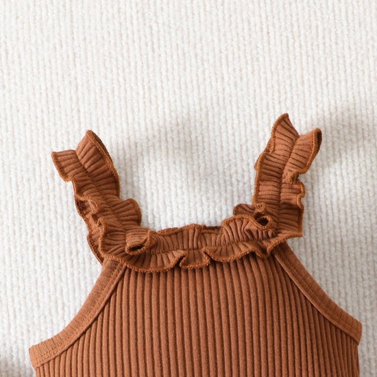 Baby Girl Clothing Ruffle Sleeveless Romper $23.50 Dana Fashion Color: Light Brown Suit Height: 100cm Baby Clothing Product information: Pattern: animal, flower Color: light brown Pants length: Shorts Suit type: shirt and pants Fabric name: Cotton Number