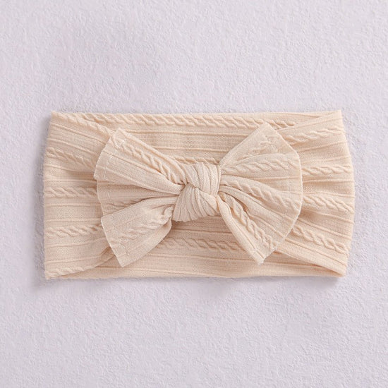 Baby Hair Accessories Elastic Head Bandwidth Edge Nylon Bow Headband For Children $8.18 Dana Fashion style: A Baby Clothing Product information: Processing process: manual Style: Children Style: Bow tie Style: European and American Material: Nylon Type: H