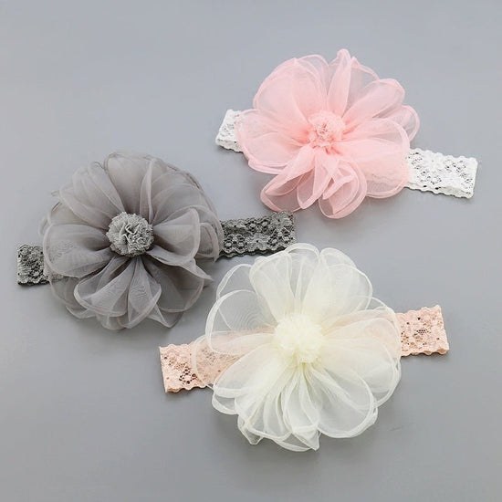 Baby hair accessories $16.97 Dana Fashion Color: Beige Baby Clothing Style : Children Material : Fabric Style : Star Street Shoot Applicable gifts occasions: employee benefits Styling : Flowers Color : Beige, gray, pink Pattern : plaid Type : Headband, ha