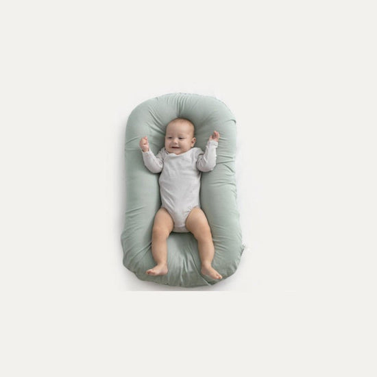 Baby Nest Bed Crib Newborn Baby Nest Cot Cribs Infant Portable Cotton Crib Travel Cradle Cushion $118.81 Dana Fashion Color: Green Size: 45x75cm Baby & Mother Overview: Portable and washable Suitable for various sleeping positions of the baby Simulate the