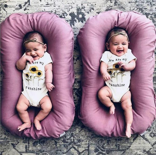 Baby Nest Bed Crib Newborn Baby Nest Cot Cribs Infant Portable Cotton Crib Travel Cradle Cushion $61.34 Dana Fashion Color: A beige Size: 45x75cm Baby & Mother Overview: Portable and washable Suitable for various sleeping positions of the baby Simulate th