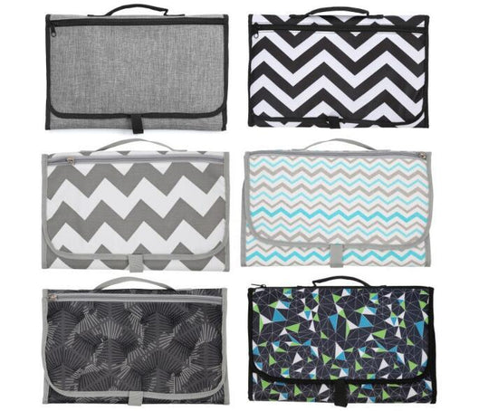 Baby Portable Foldable Washable Compact Travel Nappy Diaper Changing Mat Waterproof Baby Floor Mat Change Play Mat & Storage Bag $27.96 Dana Fashion Color: Black Baby & Mother Overview: - You can put paper towels, diapers and other items inside and you ca