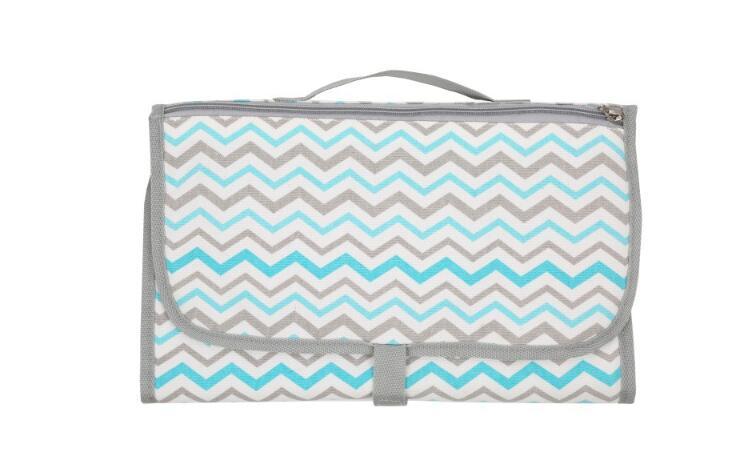 Baby Portable Foldable Washable Compact Travel Nappy Diaper Changing Mat Waterproof Baby Floor Mat Change Play Mat & Storage Bag $25.76 Dana Fashion Color: Colorful Baby & Mother Overview: - You can put paper towels, diapers and other items inside and you