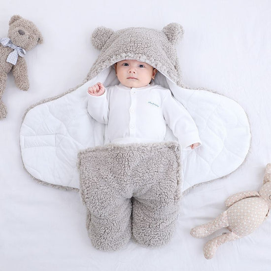 Baby Quilted Sleeping Bag Wrapper $39.60 Dana Fashion Color: Grey Size: 3M style: 1pc Baby Clothing Product Details Fabric: Cotton Blend Lining: Cotton fiber Filling: polyester cotton pattern: plain Color: white, red, gray, light blue, pink, khaki Size: 3
