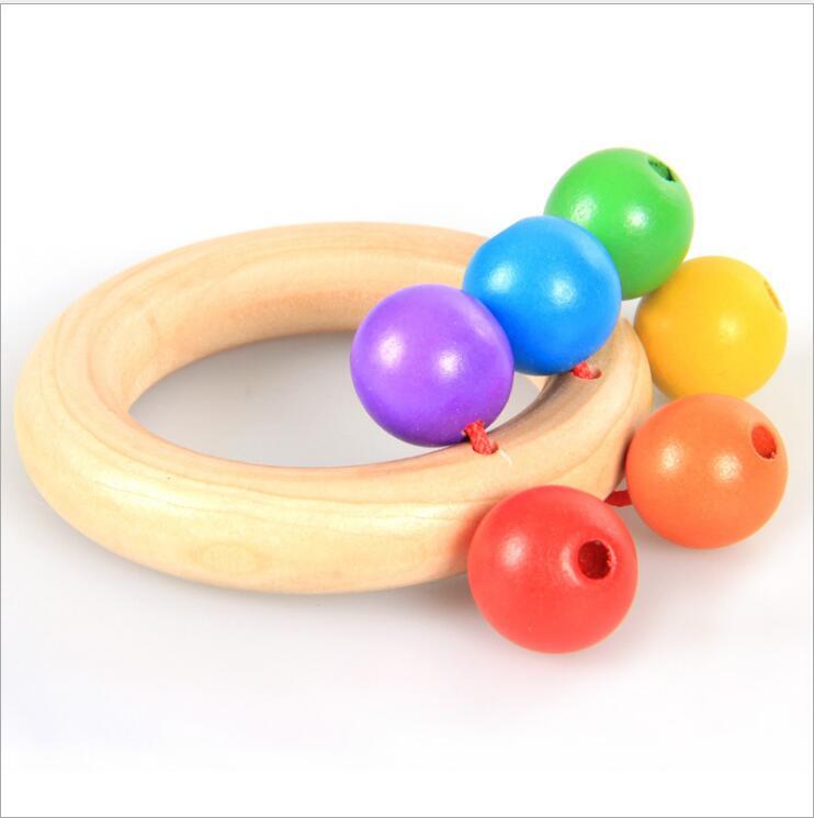 Baby rattle toy. $11.18 Dana Fashion Color: Circle Toys & Hobbies Material: wooden Packing: Blister, other Ability development: intellectual development, grasping Product Category: Hand Bell, Other Color: three ring exquisite rattle, hand-held rattle, flo