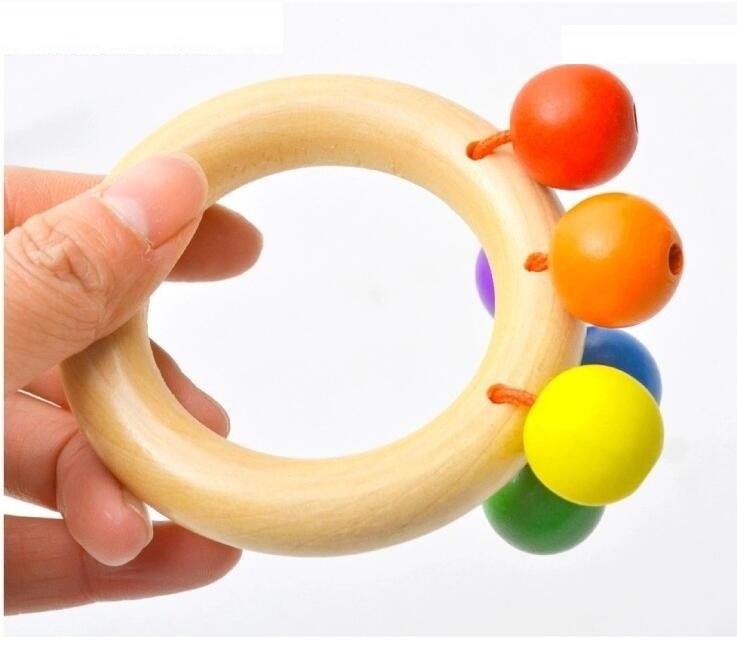 Baby rattle toy. $11.18 Dana Fashion Color: Circle Toys & Hobbies Material: wooden Packing: Blister, other Ability development: intellectual development, grasping Product Category: Hand Bell, Other Color: three ring exquisite rattle, hand-held rattle, flo