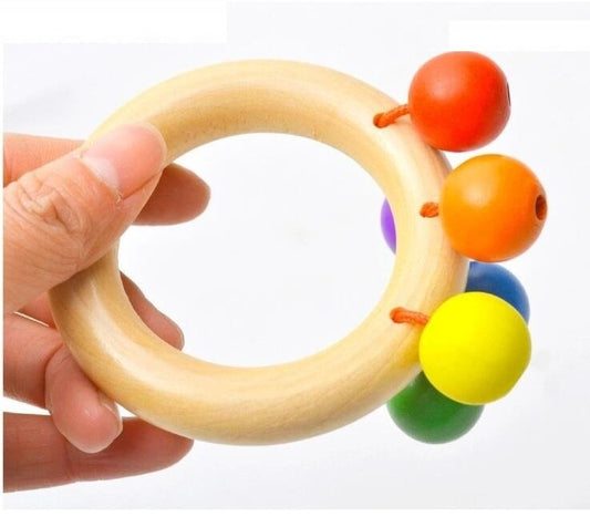 Baby rattle toy. $11.18 Dana Fashion Color: Circle Toys & Hobbies Material: wooden Packing: Blister, other Ability development: intellectual development, grasping Product Category: Hand Bell, Other Color: three ring exquisite rattle, hand-held rattle, flo