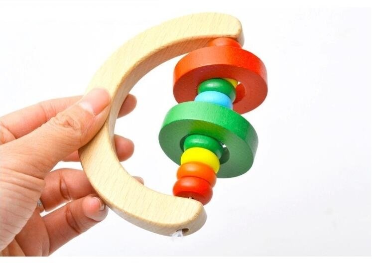 Baby rattle toy. $11.18 Dana Fashion Color: Semicircle Toys & Hobbies Material: wooden Packing: Blister, other Ability development: intellectual development, grasping Product Category: Hand Bell, Other Color: three ring exquisite rattle, hand-held rattle,