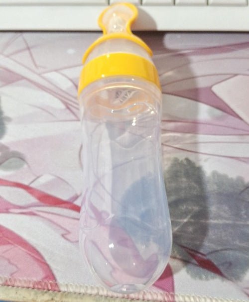 Baby Spoon Bottle Feeder $20.44 Dana Fashion Color: Yellow Baby & Mother Capacity: 120 ml Material: spoon head, bottle body [food grade silicone], other food grade PP Disinfection: can be 120 degrees or less, boiled or steamed It is used to feed semi-liqu