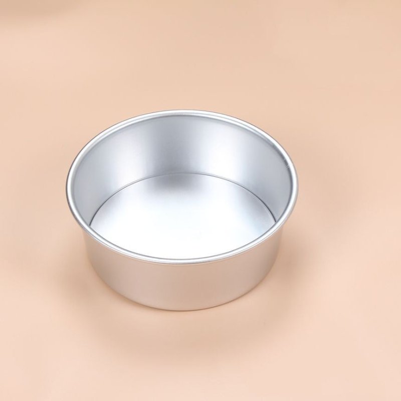 Baking Mold Cake Mold Tool Bottom Cake Mold Oven $55.45 Dana Fashion Color: Silver Dana's Kitchen Product information Product Category: Cake Mould Shape: round Material: Aluminum alloy Size: 12 inches color：silver Package: Aluminum alloy cake mold*1