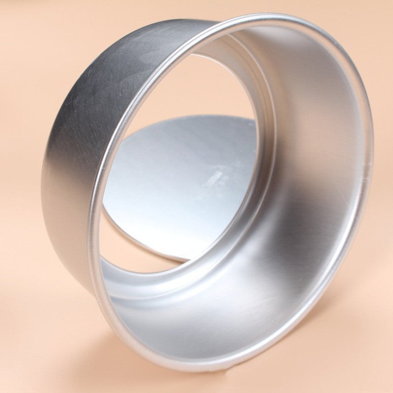 Baking Mold Cake Mold Tool Bottom Cake Mold Oven $55.45 Dana Fashion Color: Silver Dana's Kitchen Product information Product Category: Cake Mould Shape: round Material: Aluminum alloy Size: 12 inches color：silver Package: Aluminum alloy cake mold*1