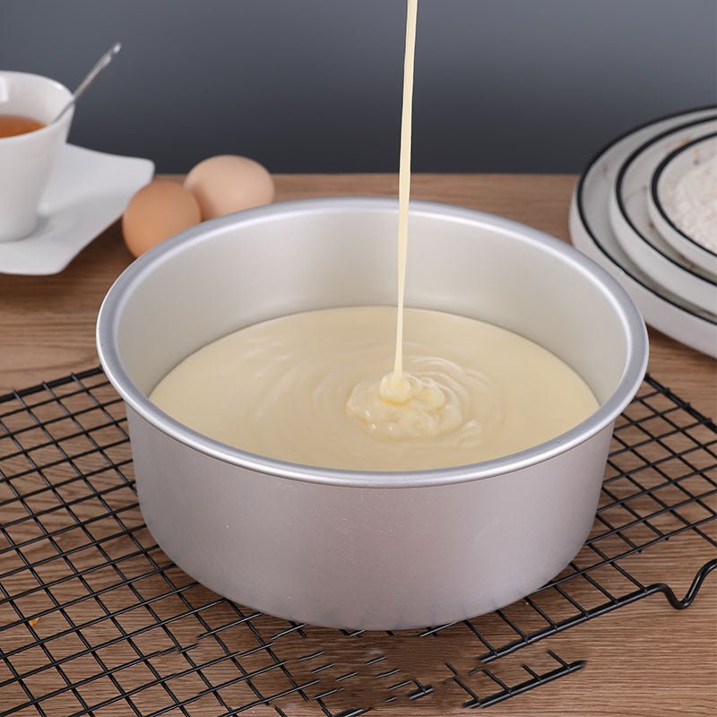 Baking Mold Cake Mold Tool Bottom Cake Mold Oven $55.45 Dana Fashion Color: Silver Dana's Kitchen Product information Product Category: Cake Mould Shape: round Material: Aluminum alloy Size: 12 inches color：silver Package: Aluminum alloy cake mold*1