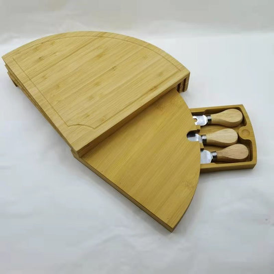 Bamboo Drawer Cheese Knife Bread Fruit Snack Plate $189.50 Dana Fashion style: Two knives Dana's Kitchen Product information: Material: Bamboo Shape: two knives, three knives Style: modern and simple Size: see picture Color: yellow Packing list: Bamboo Di