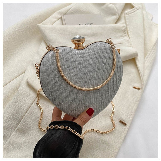Banquet Bag Love Chain Shoulder Crossbody Handbag Valentines Day Outfit $24.15 Dana Fashion Color: Silver Women's Bags Product information: Lining texture: synthetic leather Color: pink, gold, black, silver, soft shell sequins White Hardness: medium hard