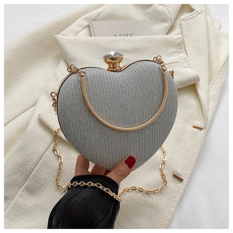 Banquet Bag Love Chain Shoulder Crossbody Handbag Valentines Day Outfit $24.15 Dana Fashion Color: Silver Women's Bags Product information: Lining texture: synthetic leather Color: pink, gold, black, silver, soft shell sequins White Hardness: medium hard