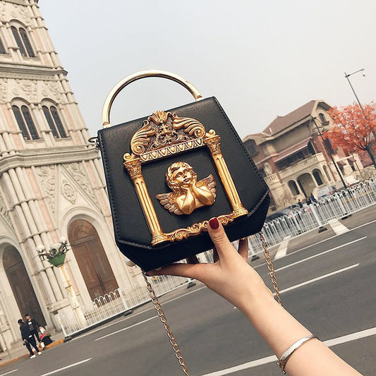 Baroque Angel Clutch Bag Ladies One Shoulder Diagonal Bag $73.99 Dana Fashion Color: Red Women's Bags Cortical features: composite cowhide Luggage trend style: small square bag Lining texture: polyester Bag shapes: square vertical section Opening method: