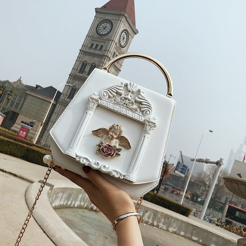 Baroque Angel Clutch Bag Ladies One Shoulder Diagonal Bag $73.99 Dana Fashion Color: Red Women's Bags Cortical features: composite cowhide Luggage trend style: small square bag Lining texture: polyester Bag shapes: square vertical section Opening method: