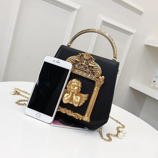 Baroque Angel Clutch Bag Ladies One Shoulder Diagonal Bag $73.99 Dana Fashion Color: Red Women's Bags Cortical features: composite cowhide Luggage trend style: small square bag Lining texture: polyester Bag shapes: square vertical section Opening method: