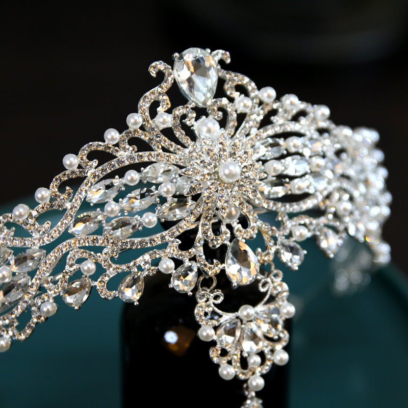Baroque Bride Crown Fashion Headwear $35.00 Dana Fashion Color: Silver Women's Accessories Product information: Material: Alloy Style: Crown Treatment process: electroplating Color: Silver+Dotted Pearl+Quota Decoration Size: diameter 15CM, height approxim