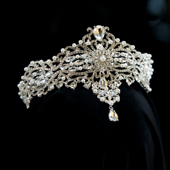 Baroque Bride Crown Fashion Headwear $35.00 Dana Fashion Color: Silver Women's Accessories Product information: Material: Alloy Style: Crown Treatment process: electroplating Color: Silver+Dotted Pearl+Quota Decoration Size: diameter 15CM, height approxim
