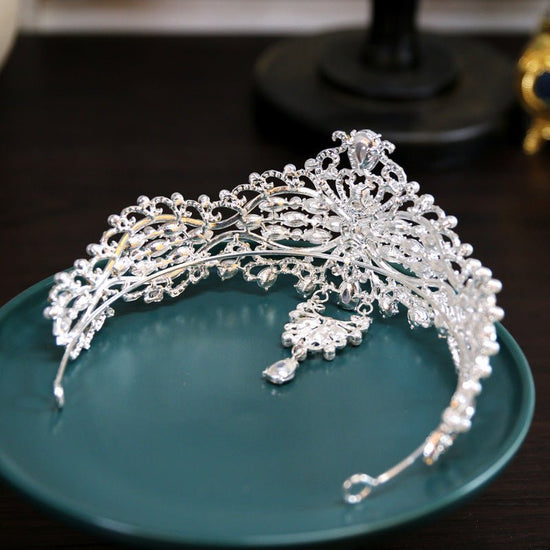 Baroque Bride Crown Fashion Headwear $35.00 Dana Fashion Color: Silver Women's Accessories Product information: Material: Alloy Style: Crown Treatment process: electroplating Color: Silver+Dotted Pearl+Quota Decoration Size: diameter 15CM, height approxim