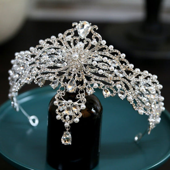 Baroque Bride Crown Fashion Headwear $35.00 Dana Fashion Color: Silver Women's Accessories Product information: Material: Alloy Style: Crown Treatment process: electroplating Color: Silver+Dotted Pearl+Quota Decoration Size: diameter 15CM, height approxim