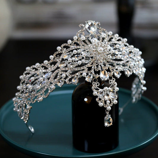 Baroque Bride Crown Fashion Headwear $35.00 Dana Fashion Color: Silver Women's Accessories Product information: Material: Alloy Style: Crown Treatment process: electroplating Color: Silver+Dotted Pearl+Quota Decoration Size: diameter 15CM, height approxim