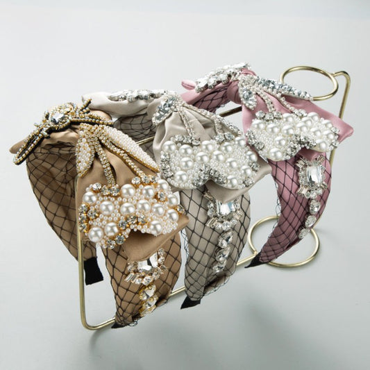 Baroque Fabric Bow Full Diamond Pearl Headband $69.50 Dana Fashion Color: Coffee Women's Accessories Product information: Color: gray, coffee, pink Applicable people: women Material: Rhinestone Popular elements: Bow Style: affordable luxury style Packing