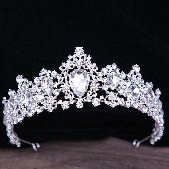 Baroque Rhinestone Crystal Bridal Crown $29.00 Dana Fashion Color: Silvery white Women's Accessories Product information: Material: Alloy Purity: KC gold Style: Retro Processing technology: diamond inlay Packing list: Crown*1