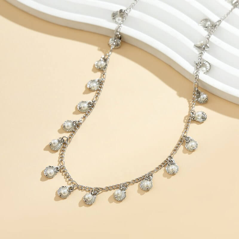 Beach Fan Shell Pearl Waist Chain $13.06 Dana Fashion Color: Gold 1574 Women's Accessories Product information: Processing Technology: manual Type: waist chain Color: gold 1574, white k 1574 Material: Plastic Shape: Geometry Packing list: Waist chain X1 P