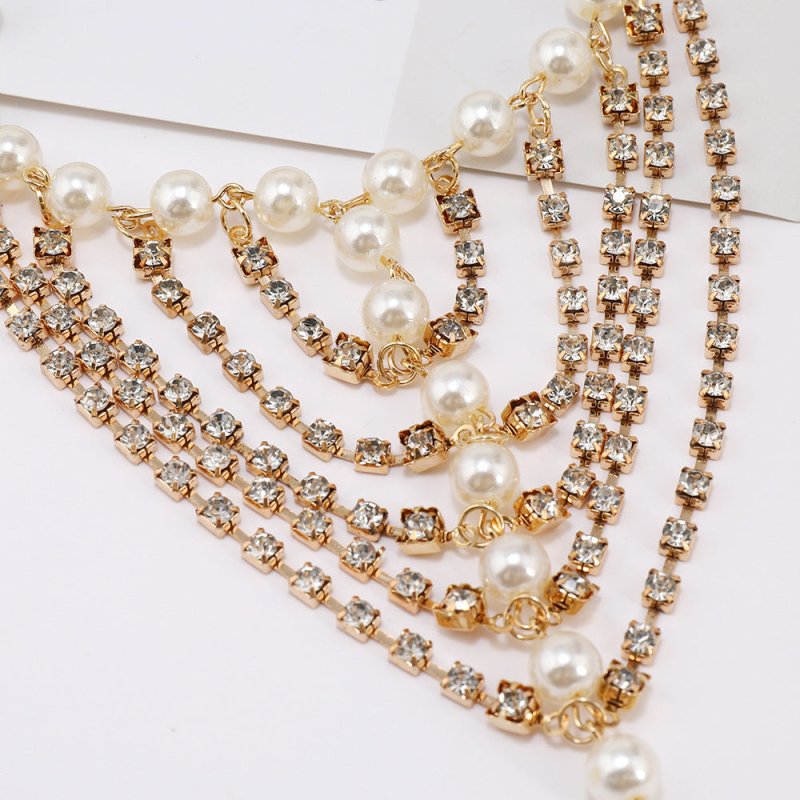 Beach Foot Ornaments Fashion Luxury Multi-layer Diamond Claw Chain Pearl Tassel $50.00 Dana Fashion Color: Gold Women's Accessories Product information: Color: gold, silver Style: Women's Material: Alloy Shape: heart shape Style: European and American Pac