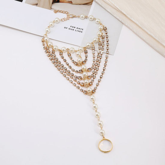 Beach Foot Ornaments Fashion Luxury Multi-layer Diamond Claw Chain Pearl Tassel $50.00 Dana Fashion Color: Gold Women's Accessories Product information: Color: gold, silver Style: Women's Material: Alloy Shape: heart shape Style: European and American Pac